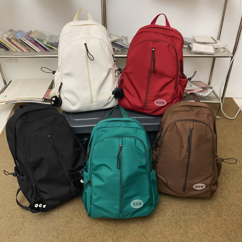 Nueva mochila simple hombre y mujer estudiante mochila de escuela media y secundaria estudiante mochila de gran capacidad Oxford tela Colegio estudiante mochila