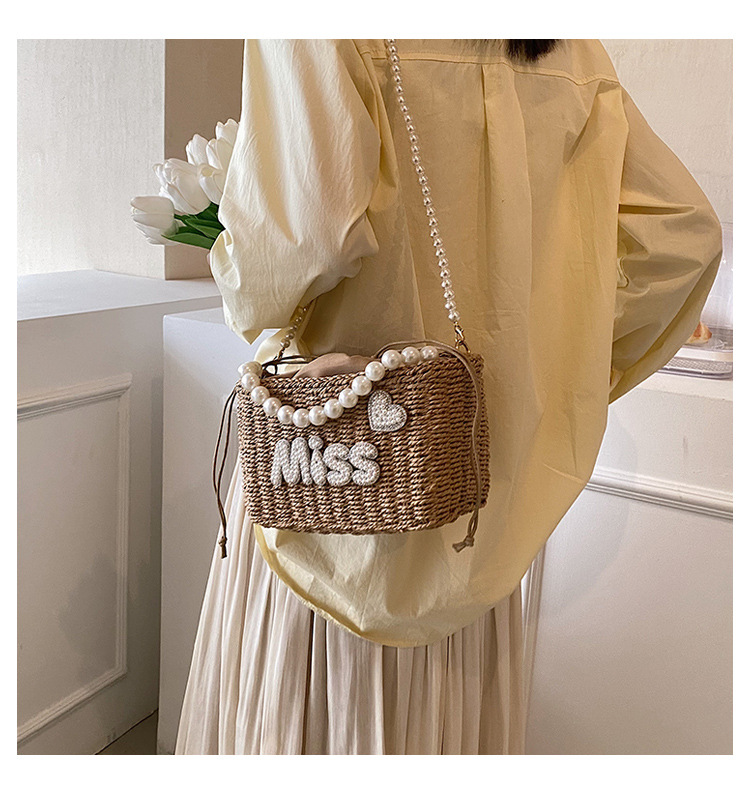 Women's Medium Straw Letter Solid Color Vacation Beach Beading Weave String Straw Bag display picture 3