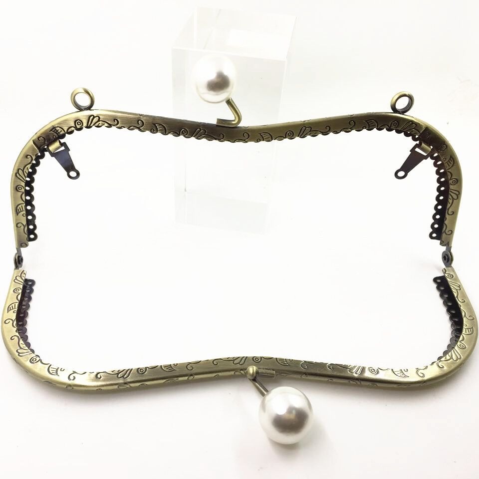 No en stock: 20.5CMM forma de dragón y phoenix encaje cabeza de perla oro caramelo cabeza de perla abrazadera