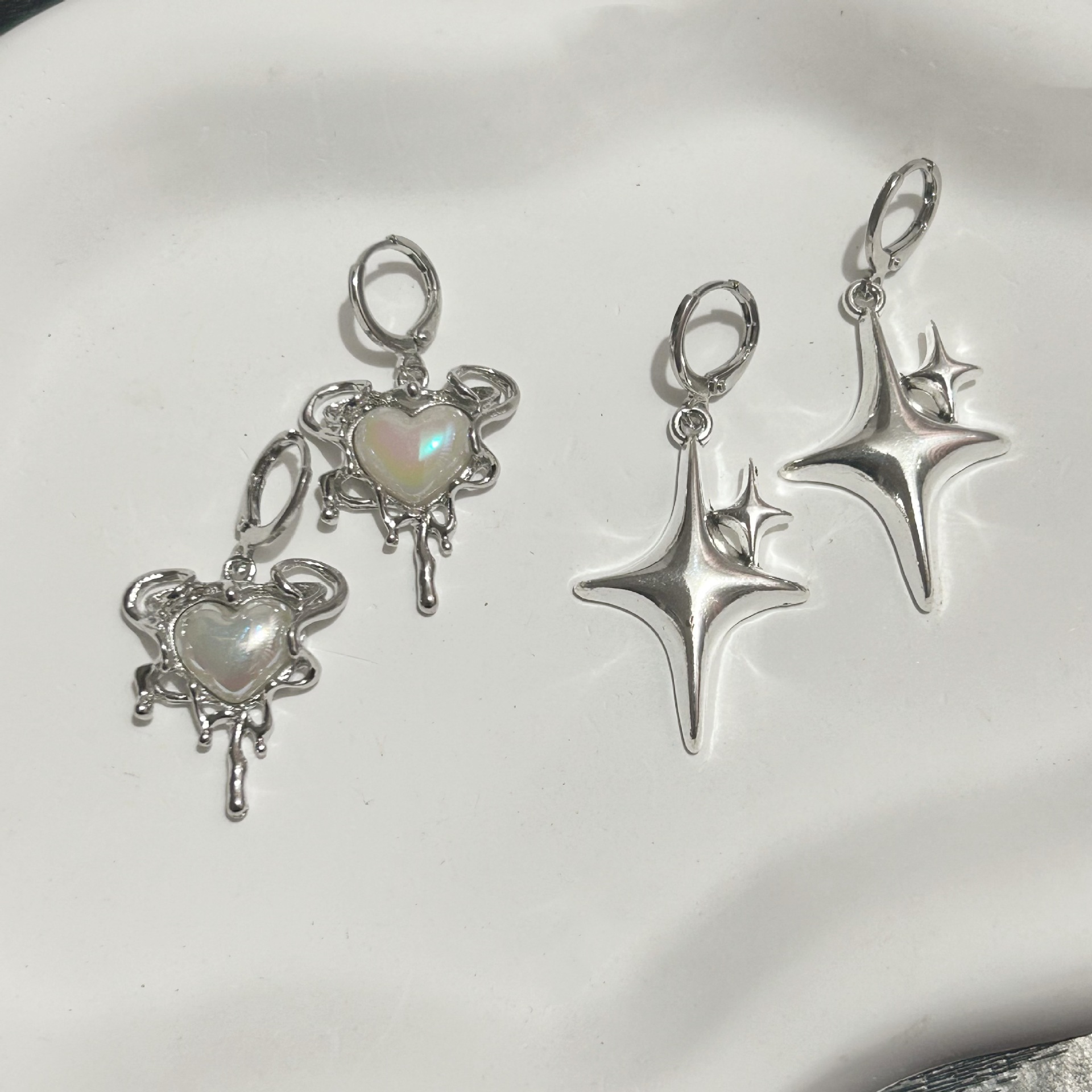 Europe and the United States cross-border love star four mans star earrings earrings high sense simple luxury autumn and winter earrings women's wholesale