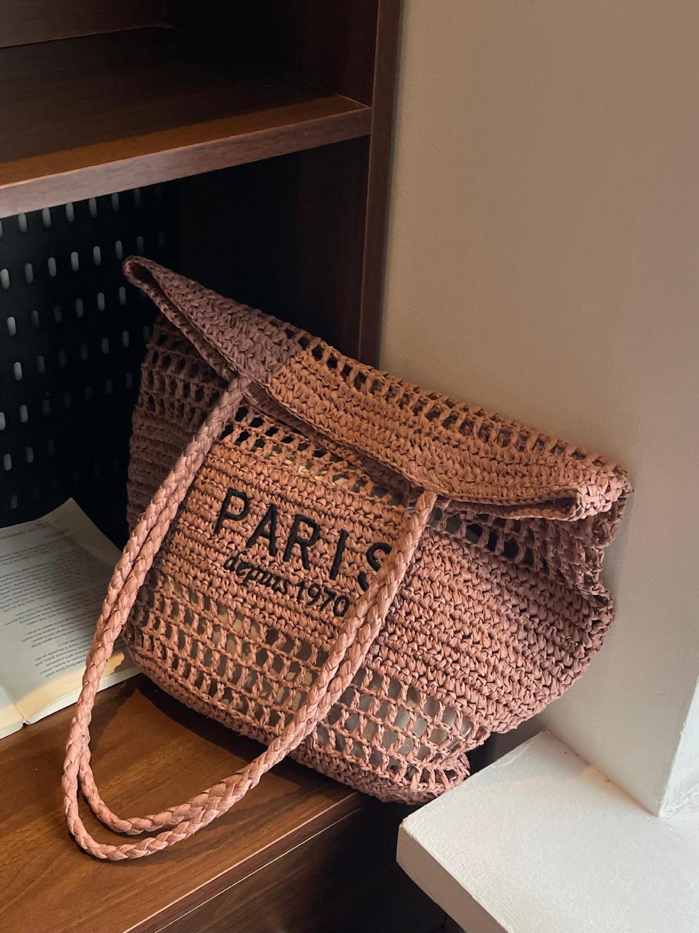 Bolso tejido de paja de moda casual para damas de gran capacidad 2025 nuevo bolso de hombro hueco tejido coreano bolso de playa