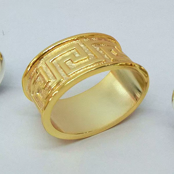 119# alloy egg-shaped all-gold zigzag pattern scarf ring