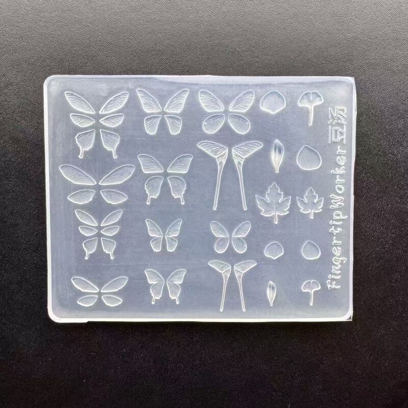 新しい豚の同じスタイルのネイルアートモールド超薄型蝶高透明 diy ネイルアートモールド突出蝶型シリコーンモールド|undefined