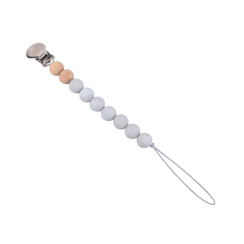 Nuevo bebé hierro clip chupete clip de silicona chupete cadena bebé molar juguete anti-gota cadena materna y suministros infantiles