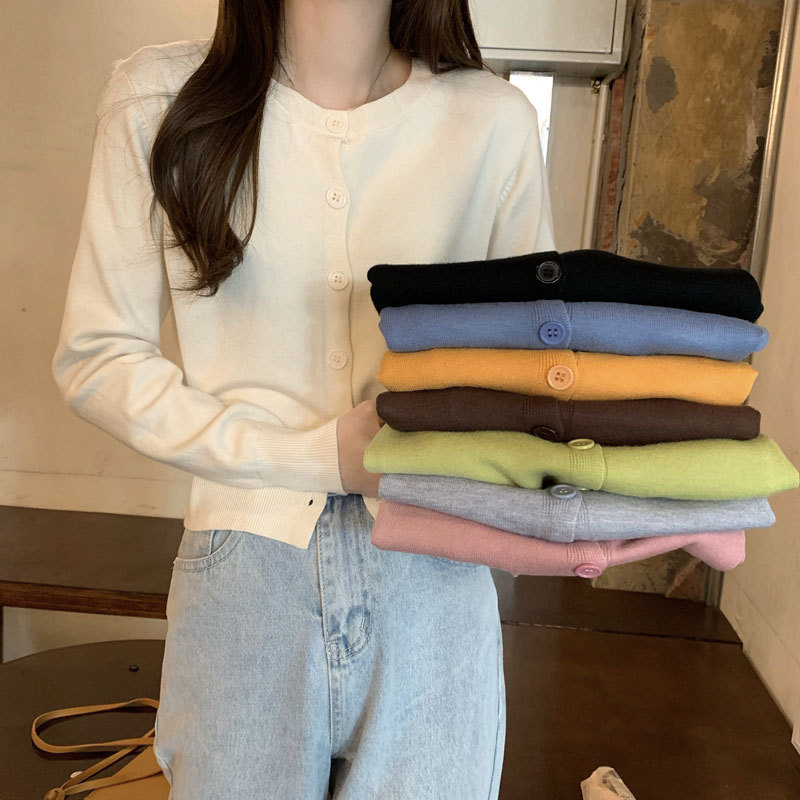春と秋のニットのカーディガンの卸売りの薄い金の韓国版の婦人服のコートの女性のニットの雑用のセーターの露店の商品の供給源|undefined