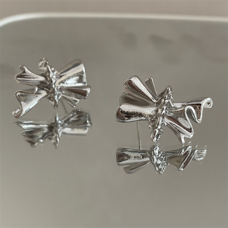 Folded Earrings Niche Design Bowknot Personality Silver Needle Earrings Korean Irregular Earrings display picture 4