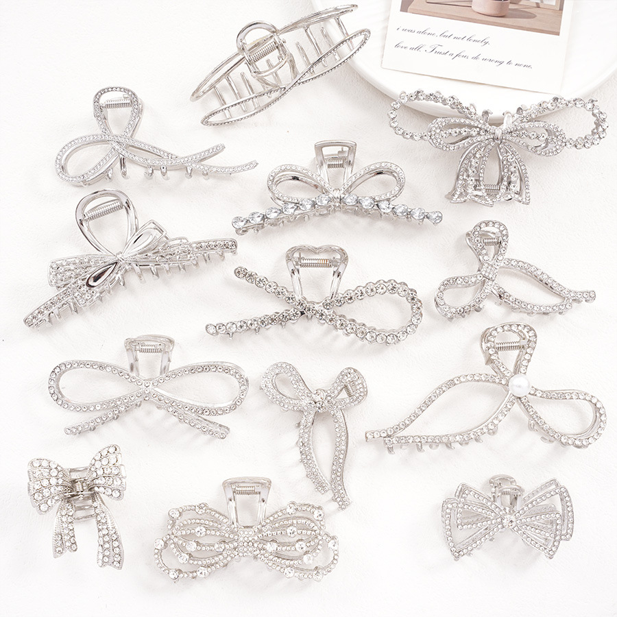 IG Style Shiny Women's Bow Knot Zinc Alloy Imitation Pearl Rhinestone Hair Claws display picture 5