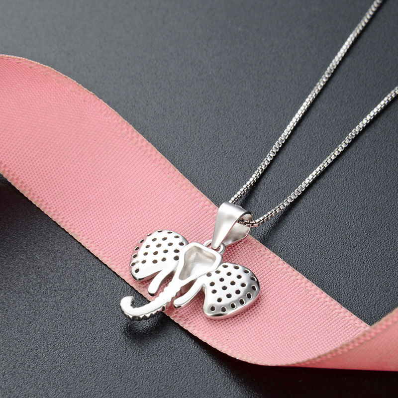Europa y los Estados Unidos collares transfronterizos de plata esterlina 925 collar de elefante nicho creativo femenino micro colgante de piedra clavícula colgante de elefante auspicioso