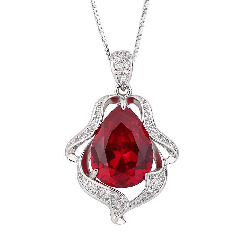 Otoño e invierno nuevo Zhuang Sheng joyería cobre inferior chapado en oro simulación rojo corindón retro gota de agua traje femenino 12*16-8*12