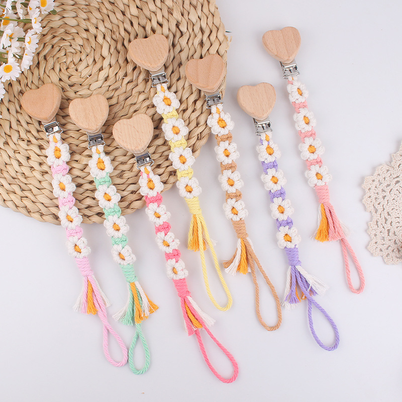 Productos para bebés, clips de chupete de haya de amor de dibujos animados, cadena de chupete de cuerda de algodón de margarita tejida a mano creativa