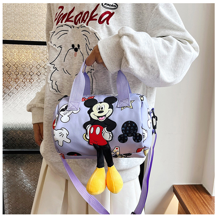 In 2024, the best-selling children's bags will feature cute Mickey Mouse-patterned bowling bags for girls, casual hand-held shoulder bags, and a unique style undefined