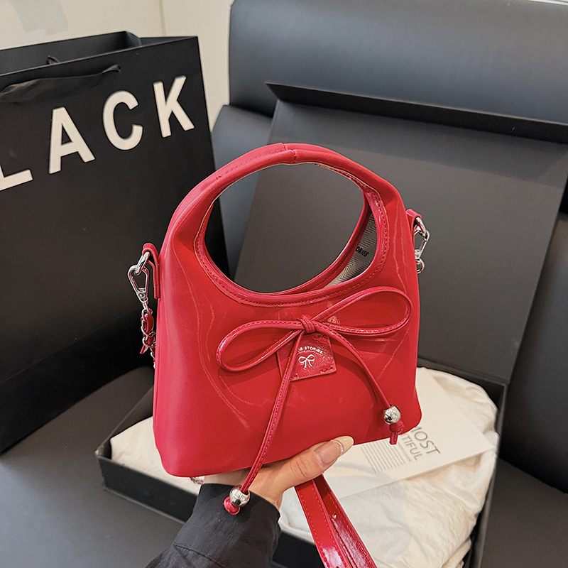 Bolso de moda coreano 2025 nuevo bolso de cadena bolso de hombro con textura esmerilada bolso de mensajero con lazo lindo