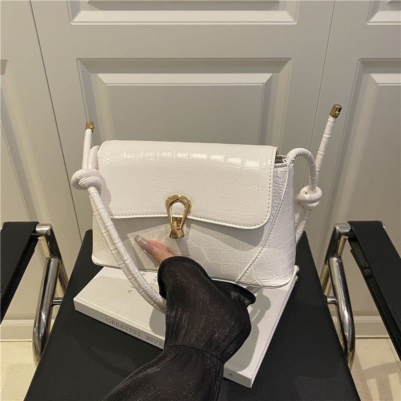 Bolso de hombro, color sólido, diseño de nicho, bolso femenino, 2025 primavera, nueva tendencia, bolso de mensajero coreano, bolso cuadrado pequeño femenino