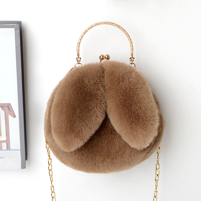 复制_2021新款兔耳朵包手提毛绒链条包包女士.jpg