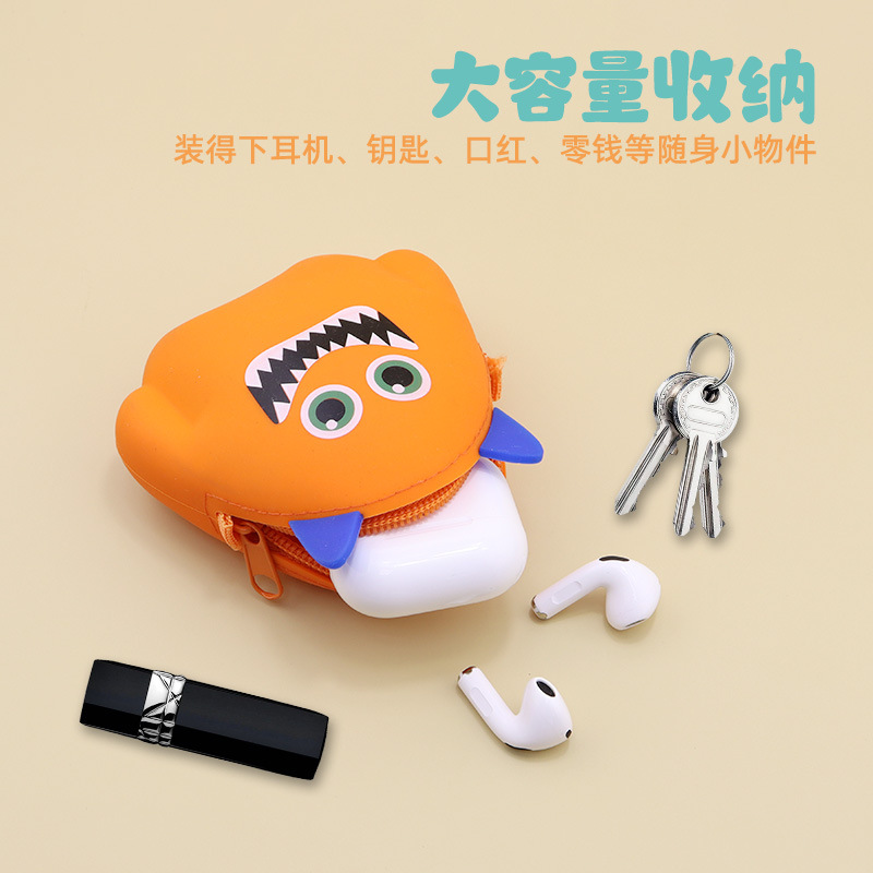 Monstruos de dibujos animados de silicona bolso de cambio de color caramelo cable de datos auriculares bolsa de almacenamiento portátil mini llave bolsa