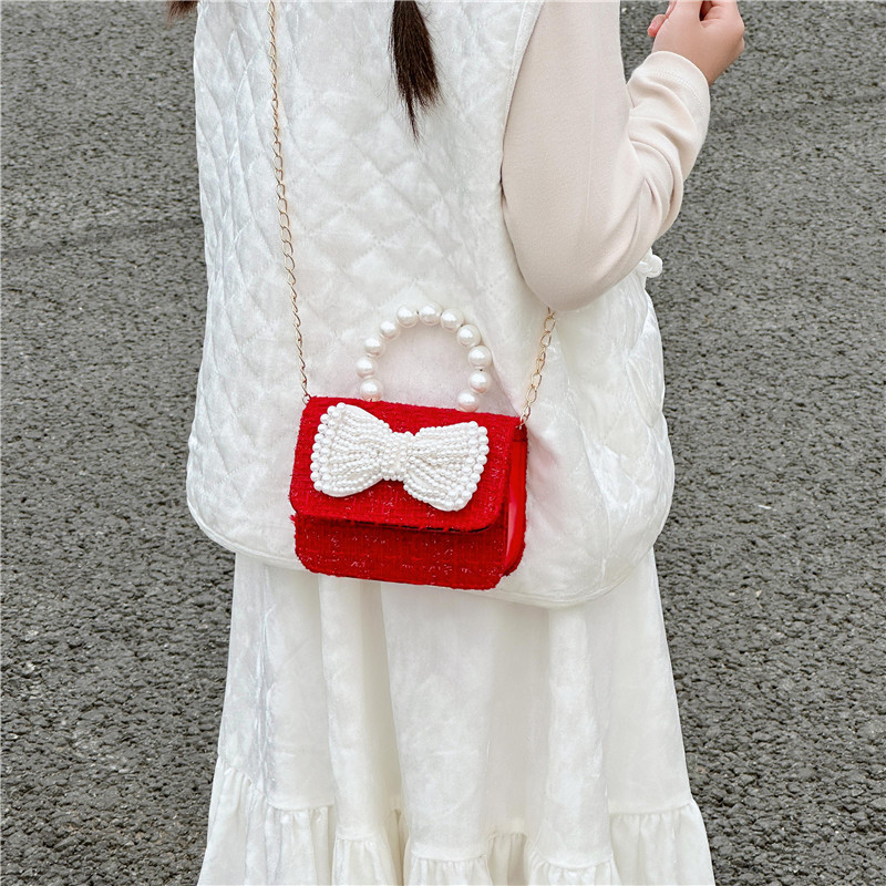 Otoño y invierno nuevo bolso de princesa infantil bolso pequeño cuadrado rojo de chicas cadena de hombro mochila de perlas bolso de cambio