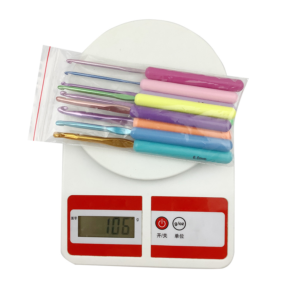 Nueva herramienta de ganchillo color mango de plástico traje de ganchillo ABS ganchillo de aluminio 9 unids/set BOLSA DE OPP