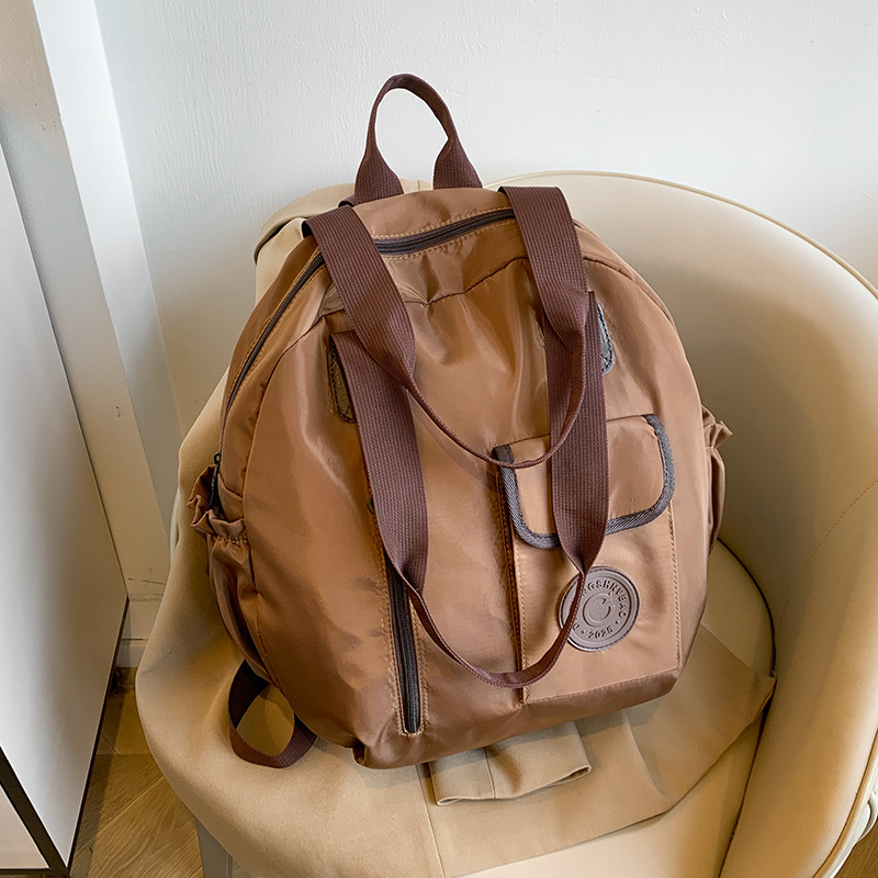 Otoño nuevo estilo de alta sensación compacto simple versátil gran capacidad viaje mochila de hombro bolsa multipropósito hombro