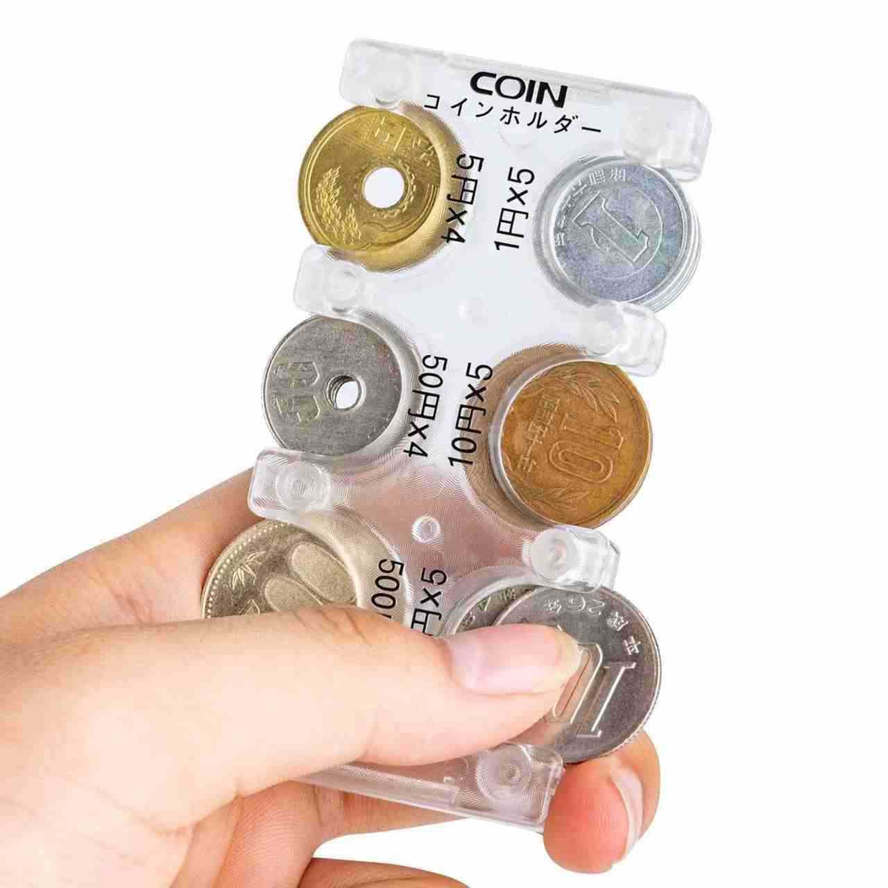 日本の硬貨は小銭を挟みます。PVC透明収納バッグは携帯します。