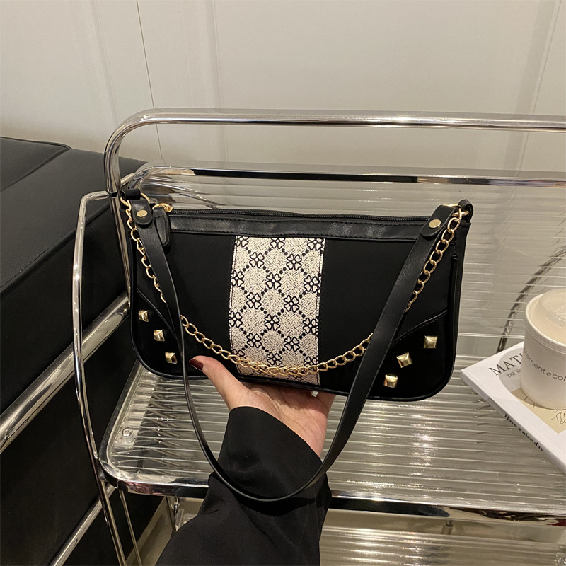 Bolso de mujer 2025 primavera nueva moda retro esmerilado empalme bolso de color contraste bolso de mujer un hombro brazo bolso de moda