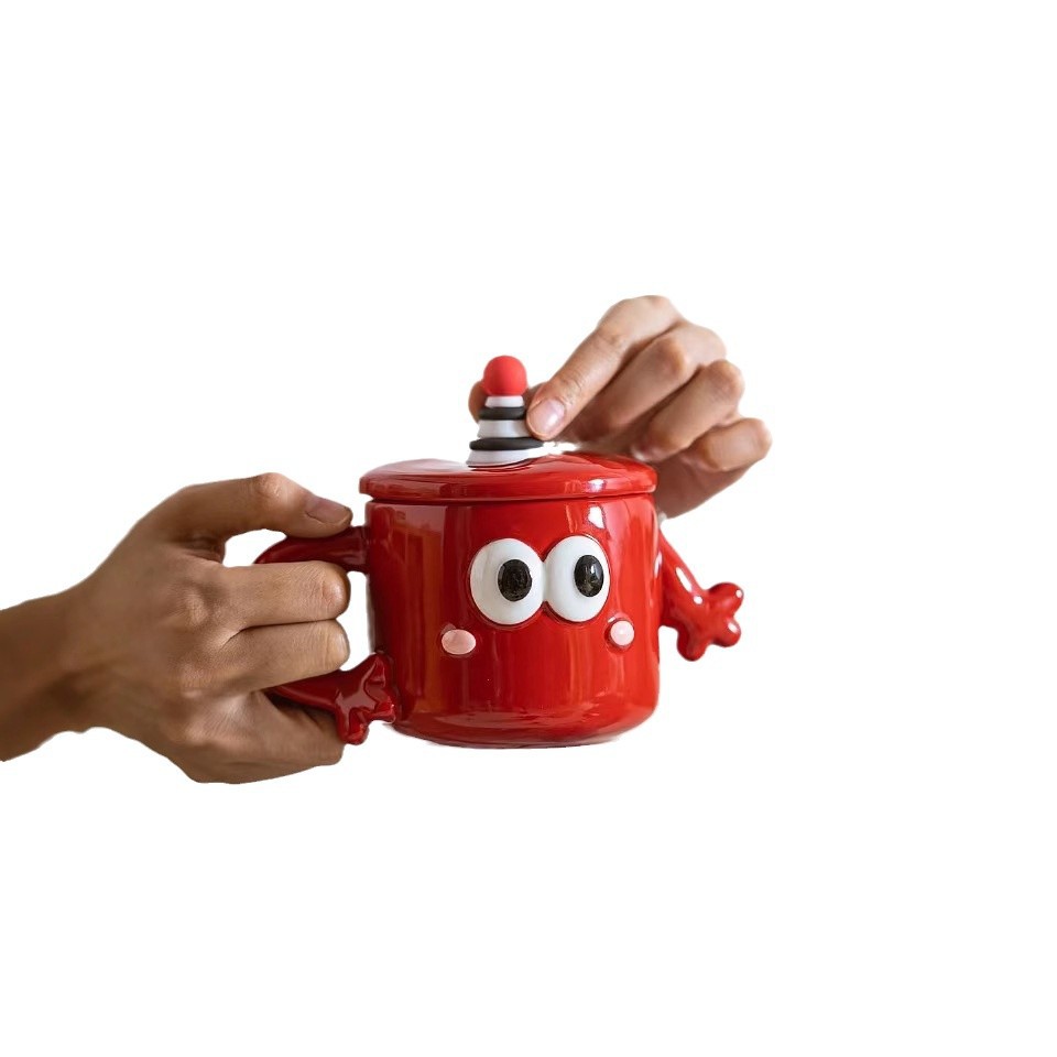 Personalidad de dibujos animados adorables ojos grandes negros y rojos copas de agua de cerámica encantadora mano a mano taza con cubierta taza de café cuchara