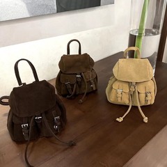 赤い本の超火の女性バッグの高級感のスエードのフロストのリュックサックの牛革の小さいリュックサックの小さい大衆のデザイン感の女性バッグの潮