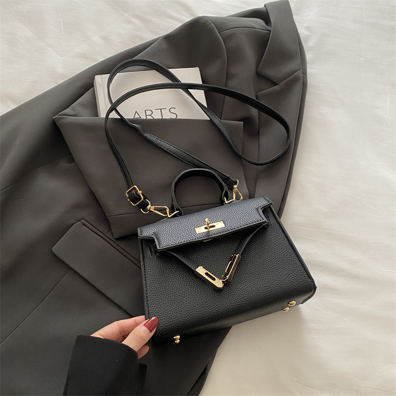 Nicho de alta sensación simple bolso de mano mujer 2024 nueva moda versátil bolso Kylie de moda bolso pequeño