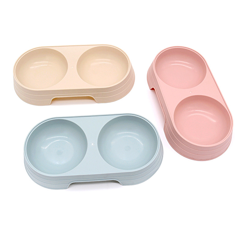 Mascota doble tazón de plástico para perros comida cuenca macaron color perro alimentador caramelo color gato bebedero en stock al por mayor
