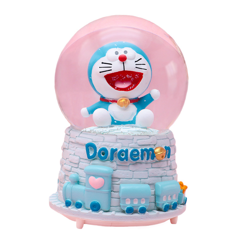 Linda campana tren azul gordo bola de cristal caja de música para niños y compañeros de clase regalo caja de música de nieve brillante