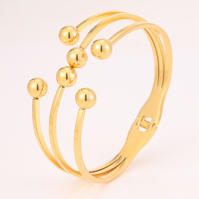 Brazalete de acero de titanio abertura esfera simétrica temperamento femenino versátil diseño de personalidad de alta calidad brazalete de acero de titanio no se desvanece