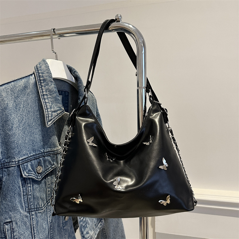 Bolso de cadena de moda popular para mujeres 2024 verano nuevo bolso de hombro de gran capacidad nicho mariposa mochila de trabajo