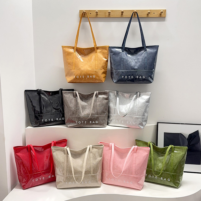 Tote Bag for Commuting, High-End, Large-Capacity Women's Bag, Pvc Dupont Paper, Versatile, Waterproof, Shiny Leather Shoulder Bag with Printed Logo Tote Bag for Commuting, High-End, Large-Capacity Women's Bag, Pvc Dupont Paper, Versatile, Waterproof, Shiny Leather Shoulder Bag with Printed Logo