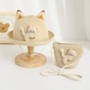 Beige hat, bag