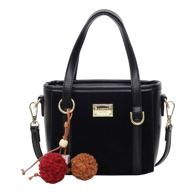 Bolso coreano retro de alta calidad bolso de cubo de agua mujer otoño / invierno 2025 nuevo simple bolso de hombro mochila casual