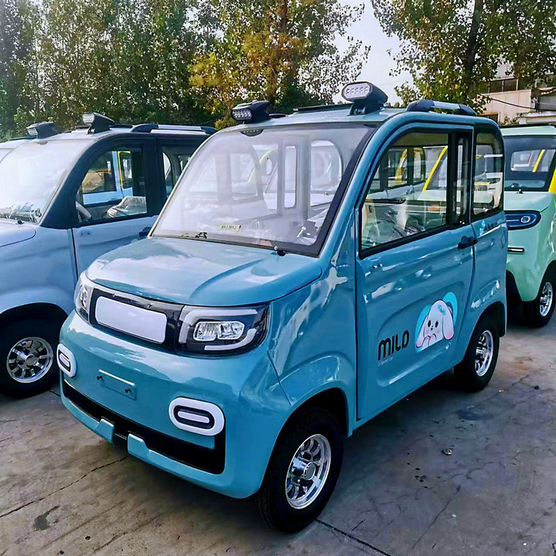 两门迷你电动四轮车 方向盘手把式可选择 接送孩子封闭式电动车