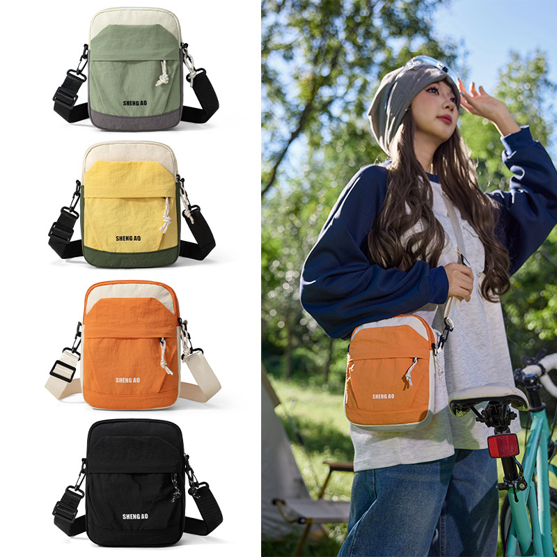 Lightweight outdoor sports phone bag for women, new portable shoulder bag, casual and versatile, with a stylish and sophisticated design, and a contrasting color crossbody bag for men