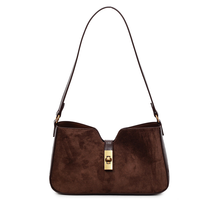 Transfronterizos de alto nivel esmerizado bolsas de brazo portátiles mujeres 2025 invierno nuevo tipo de lujo nicho bolso de hombro de viaje mochila