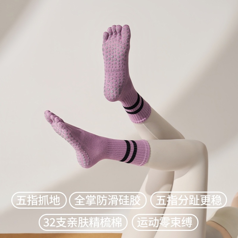 Calcetines largos de yoga a rayas para primavera, calcetines de cinco dedos al por mayor, calcetines de Pilates profesionales antideslizantes para mujer, calcetines deportivos con dedos separados.