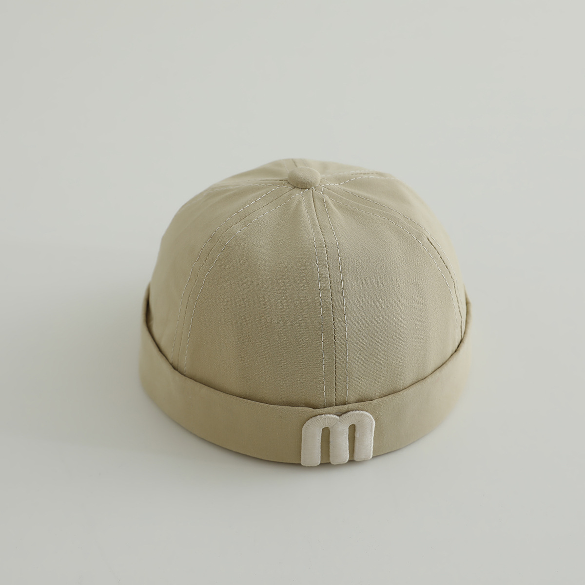 letras coreanas m niños terratenientes sombrero primavera y otoño modelado cóncavo de moda para hombres y mujeres bebés sombrero de tela de color sólido