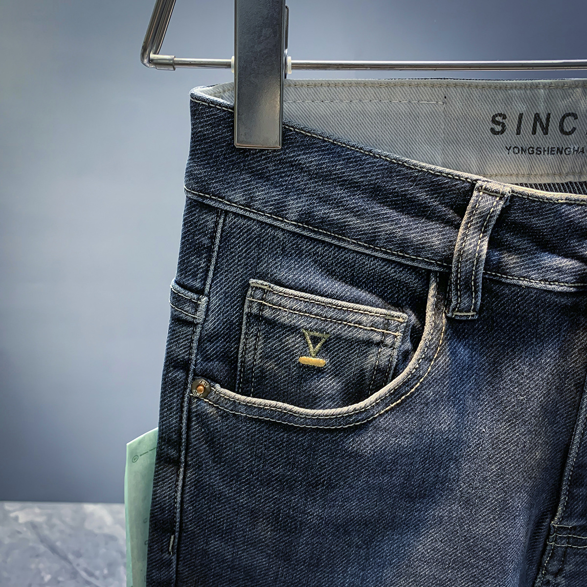 Jeans élastiques de marque de mode européenne pour les nouveaux styles de printemps et d'automne, pantalons polyvalents slim fit haut de gamme pour hommes_voghion.com