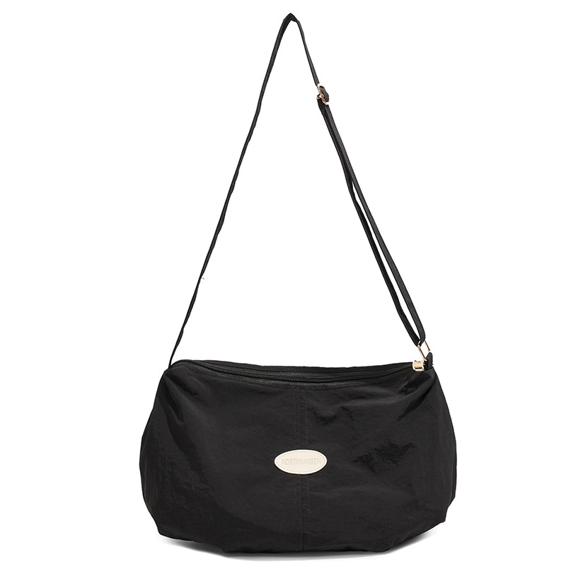 Bolso de color sólido universal 2025, nuevo bolso de bolsas de bolsas de bolsas de moda de hombro, mochila de viaje casual para hombres y mujeres.