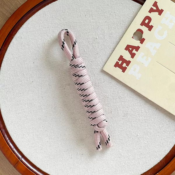 Dark pink black dot-braided rope shoe hanger