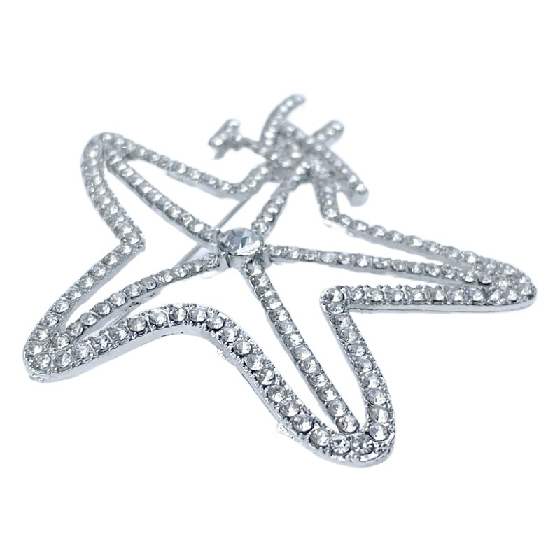 Venta caliente europea y coreana pin luz lujo moda viajero versátil estrella de cinco puntas broche Inglés estilo Chanel ramillete personalizado Accesorios