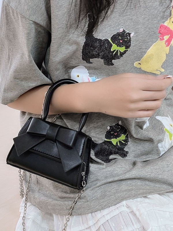 Bolso de mujer 2025 tendencia de primavera nuevo arco de moda para niños bolso de hombro de estilo extranjero bolso de mano