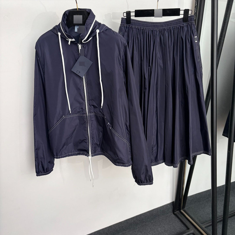 New nylon set with drawstring long-sleeve hooded sun-protective windbreaker jacket + double-pocket mid-length pleated skirt for women