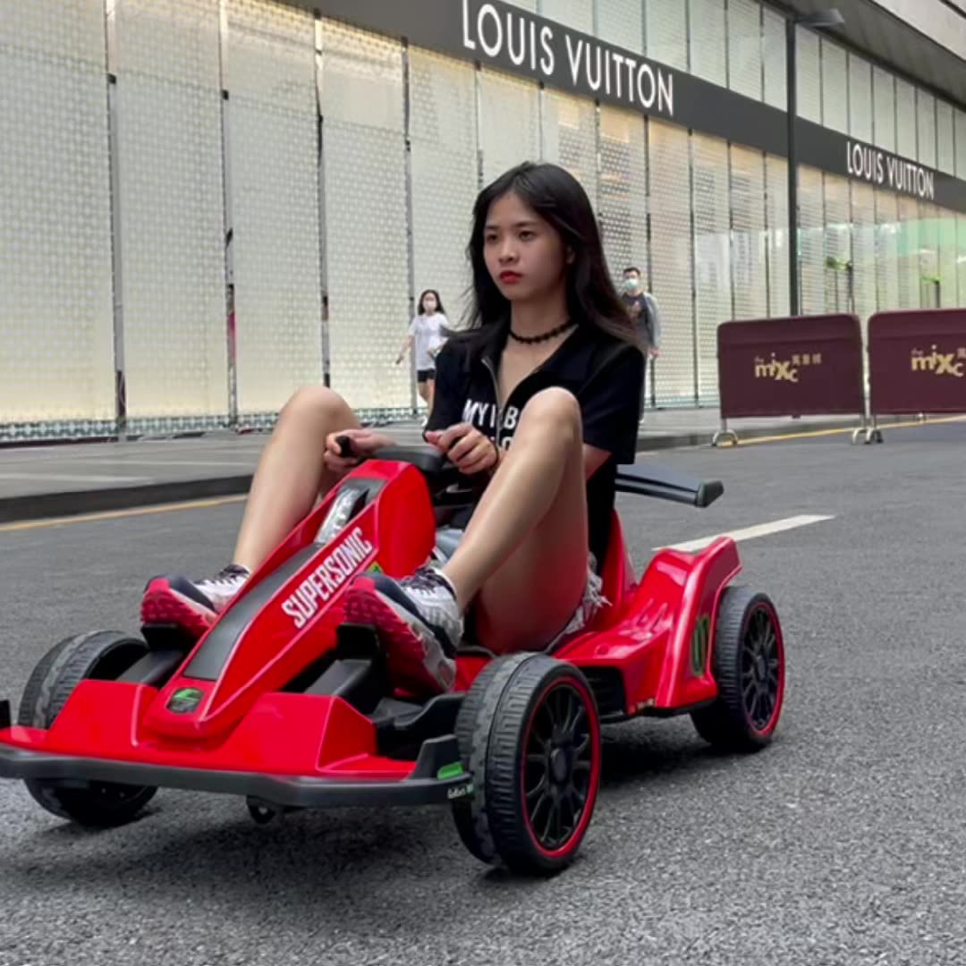 Kart eléctrico para niños de cuatro ruedas coche de control remoto sentado bebé niña coche de juguete niño cochecito al por mayor