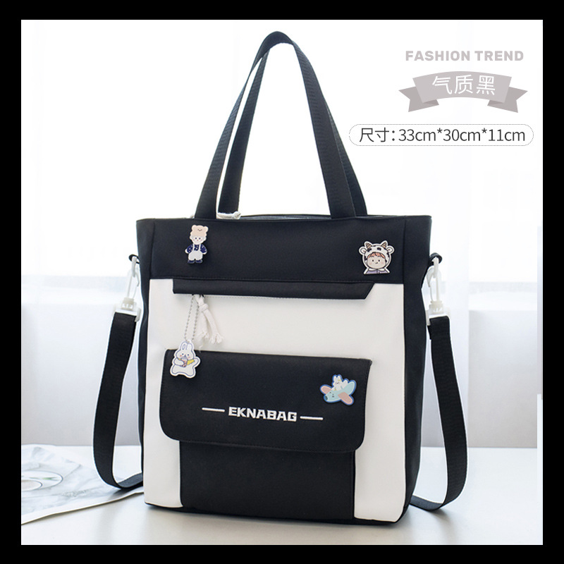 Bolso de matrícula de gran capacidad Bolso de hombro para estudiantes de primaria Bolso de mano Macaron Bolso de reparación de doble hombro Bolso bandolera de arte cruzado