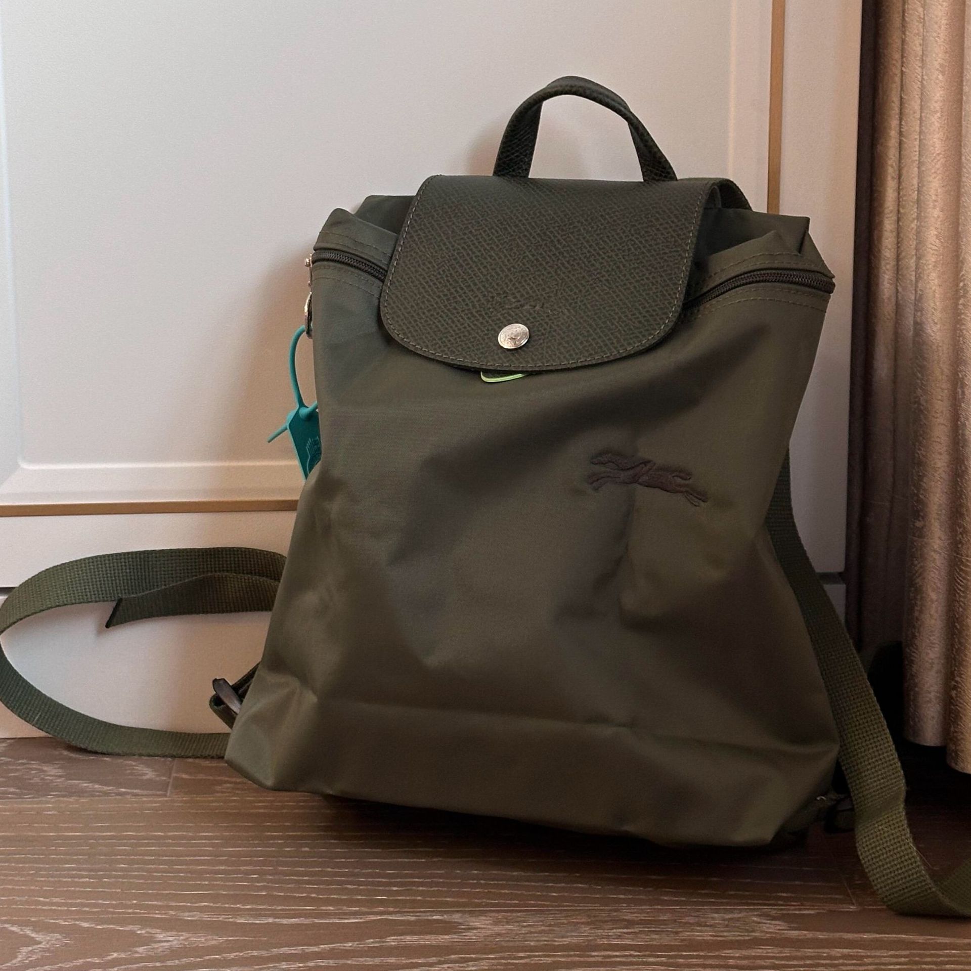 Environmentally friendly forest green backpack