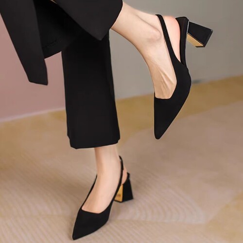 Oversized round-toe wedge sandals with a black, open-toe design featuring a pointed toe, a back strap, and a mid-heel. Perfect for summer fashion.