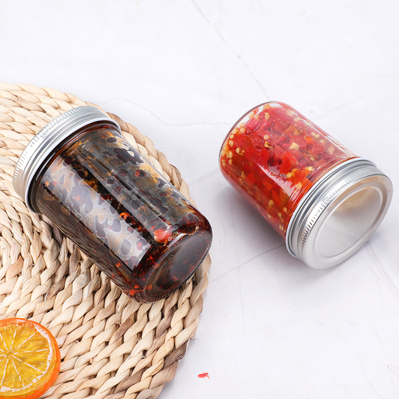 Salsa de pescado al por mayor botella de vidrio sellada puede botella de salsa de Chile doméstica con tapa miel sub-botella fábrica al por mayor